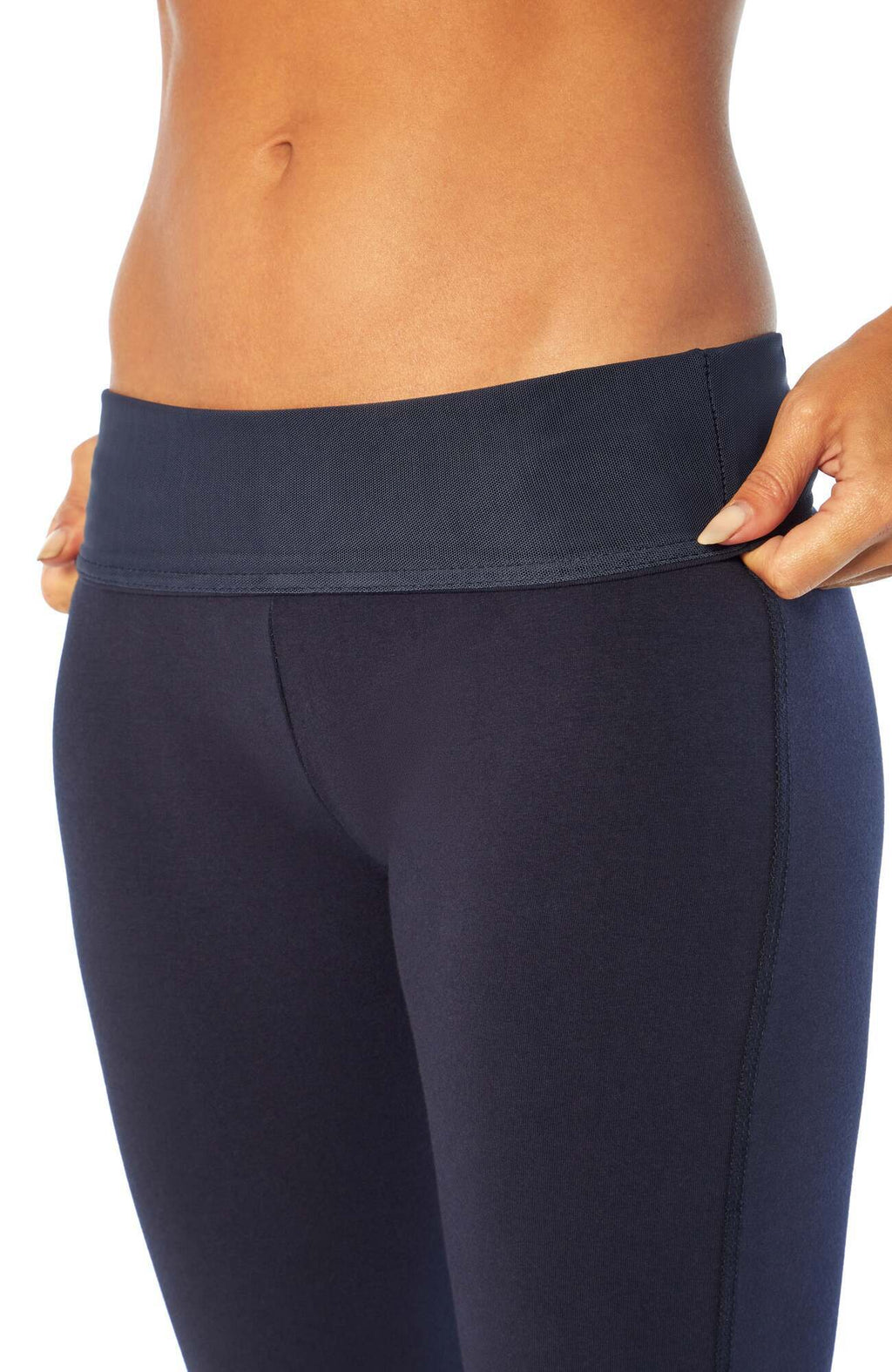 Becca Tummy Control Bermuda Shorts, side view showing pocket placement, showing visible design features and texture of the soft knit fabric.. #color_midnight-blue