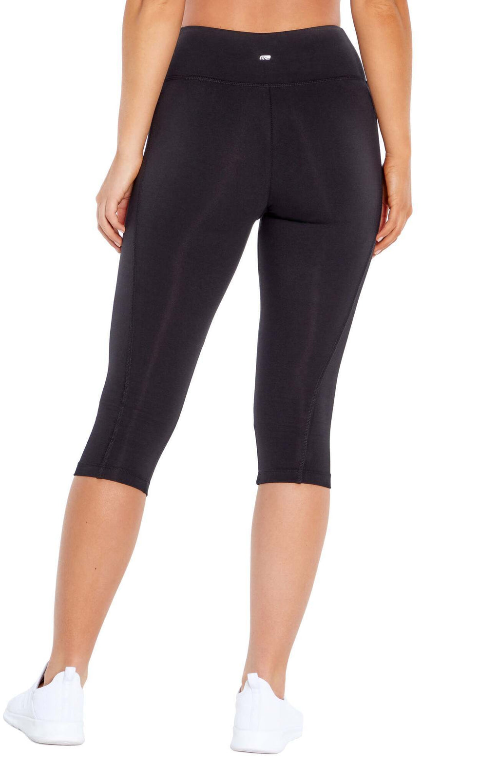Carrie Slimming Capri, alternate angle view, showing visible design features and texture of the soft knit fabric.. #color_black