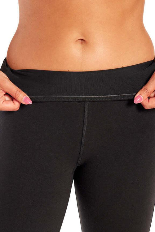 Audrey Tummy Control 29" Pants, close-up view of fabric and stitching, showing visible design features and texture of the durable stretch fabric.. #color_black