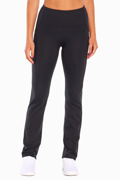 Della Pant - Black, alternate angle view, showing visible design features and texture of the durable stretch fabric.. 