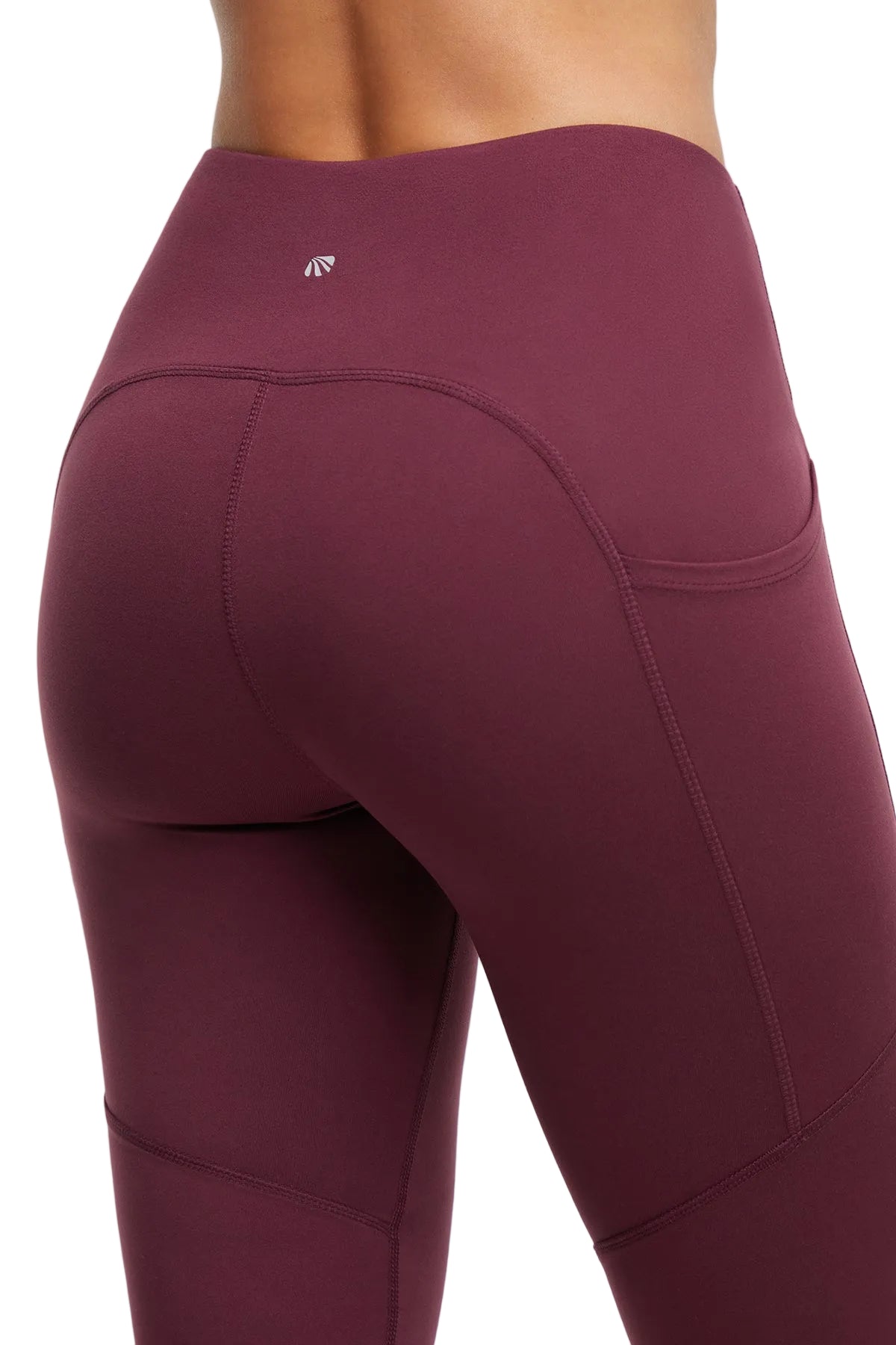 Della Pant - Fig, side view showing pocket placement, showing visible design features and texture of the durable stretch fabric.. 