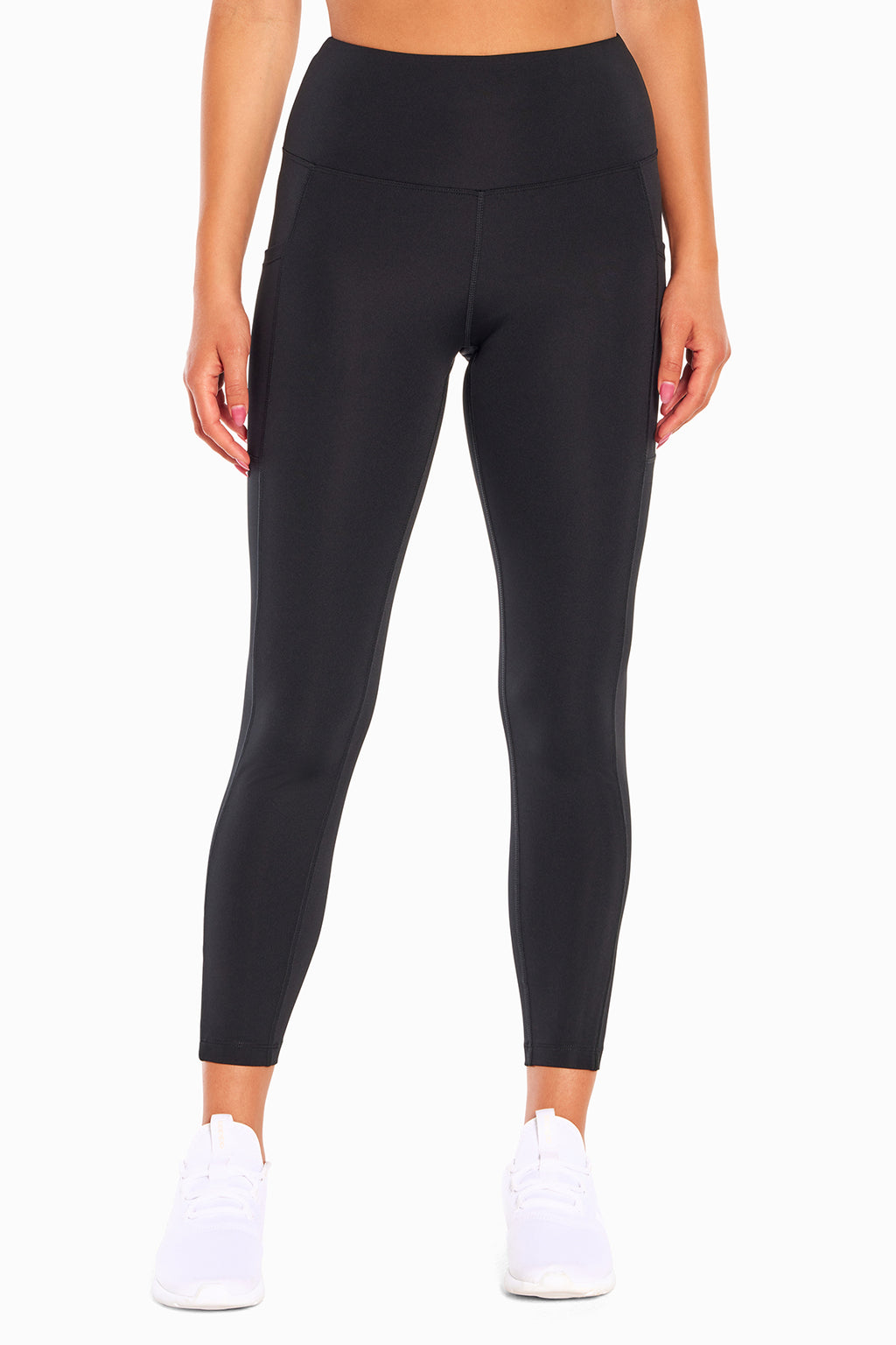 High Rise Side Pocket Ankle Legging - Black, alternate angle view, showing visible design features and texture of the stretch knit fabric.. #color_black