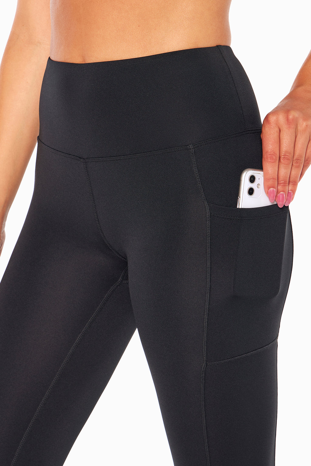 High Rise Side Pocket Ankle Legging - Black, close-up view of fabric and stitching, showing visible design features and texture of the stretch knit.. #color_black