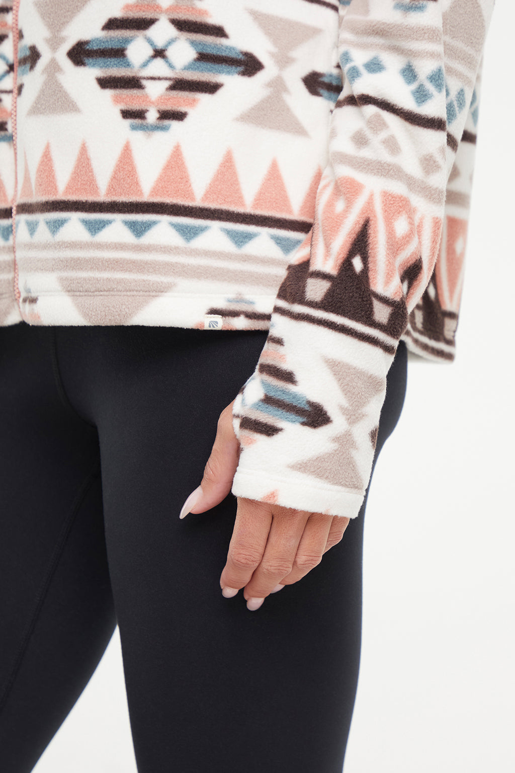 Treeline Fleece Jacket - Cameo Brown Geo Tapestry, alternate angle view, showing visible design features and texture of the smooth woven fabric. #color_cameo-brown-geo-tapestry