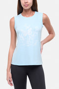Front view of woman wearing a light blue sleeveless top with white butterflies design on a plain background. #color_heather-ocean-current-butterfly-bunch