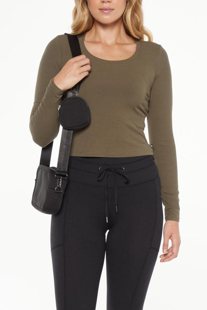 Joyce Sling Bag, close-up view of fabric and stitching, showing visible design features and texture of the soft knit fabric.