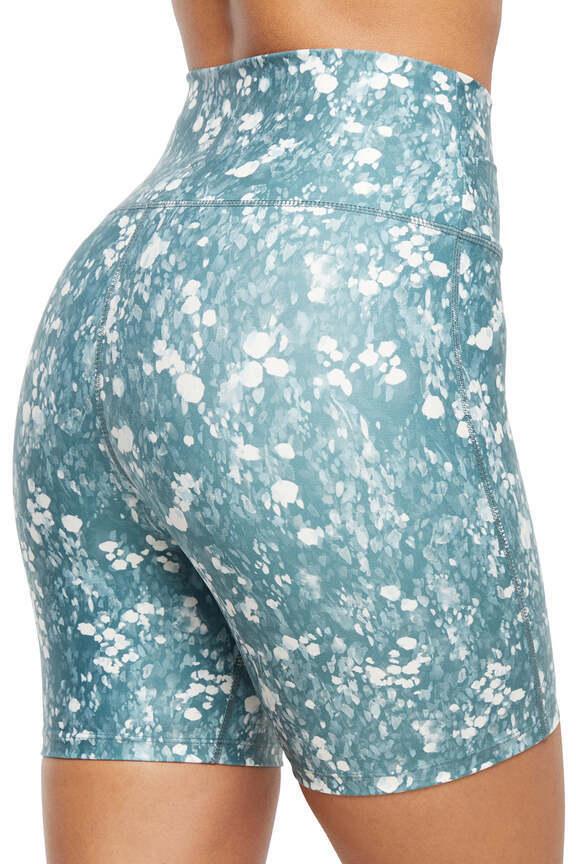 Lotus Zen Bermuda - Sagebrush Green Spots, side view showing pocket placement, showing visible design features and texture of the soft knit fabric.. 