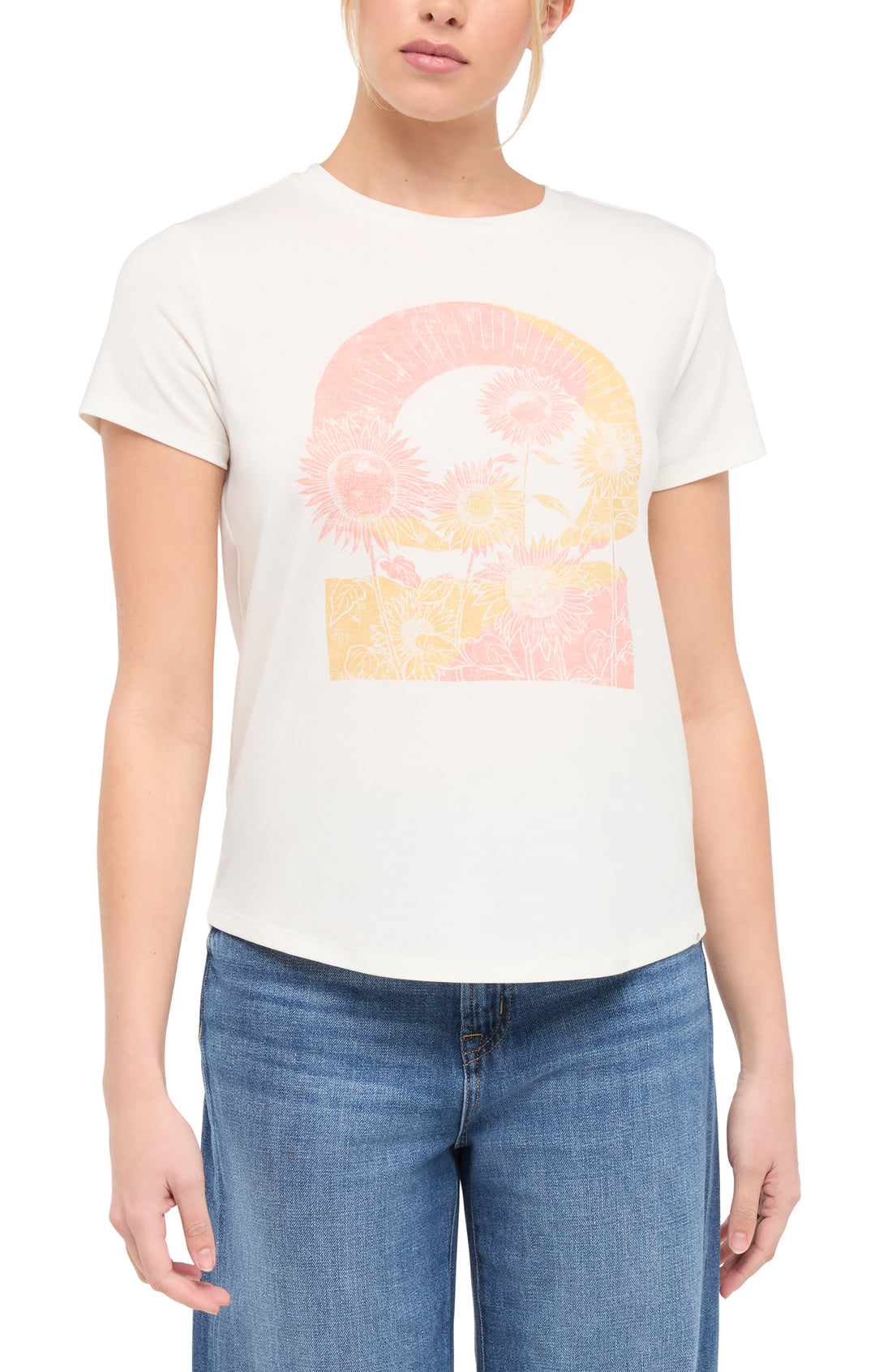 Front view of woman wearing a white t-shirt with colorful tie-dye sunflowers graphic on a white background.
