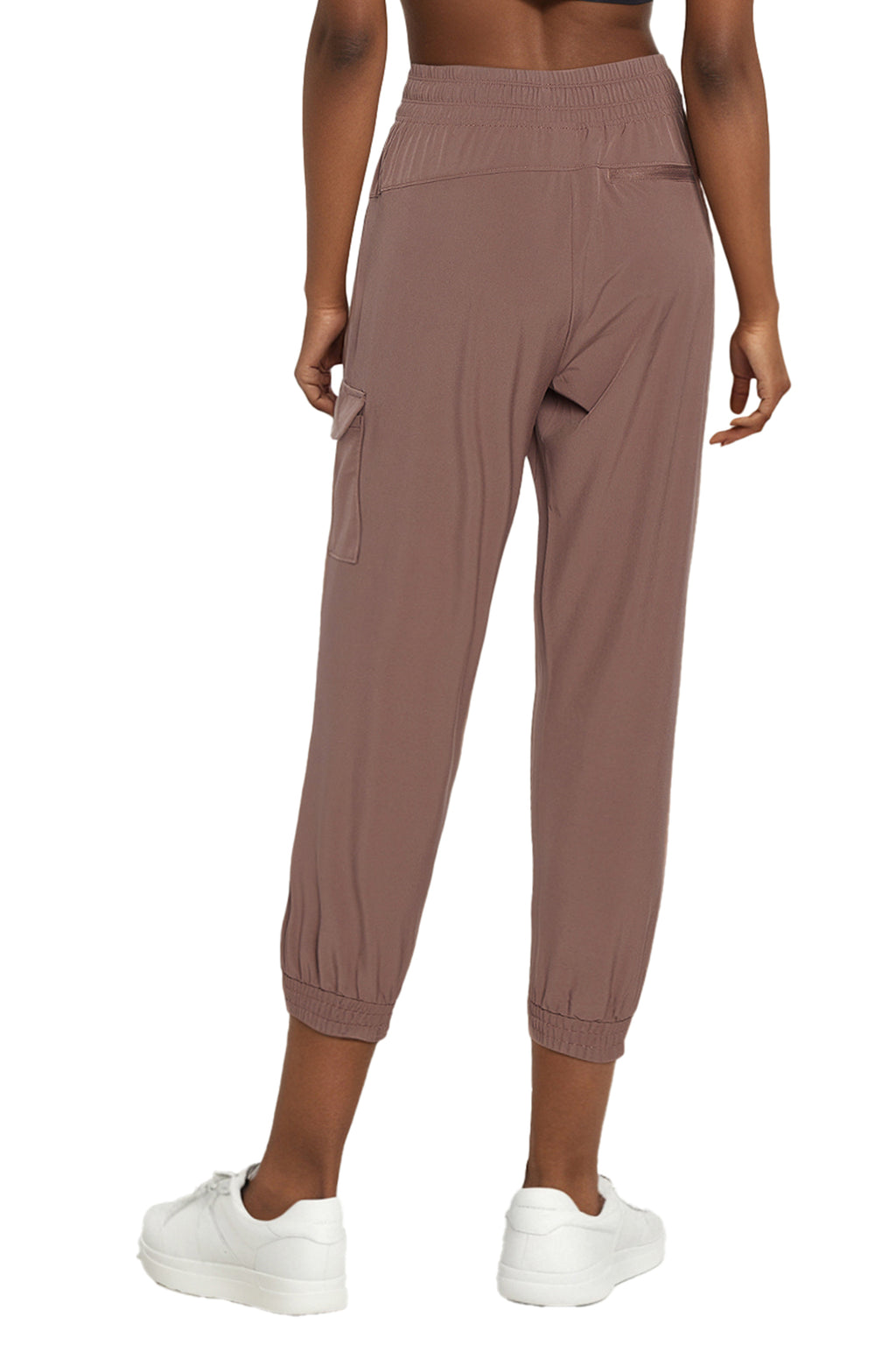 Emma Jogger, side view showing pocket placement, showing visible design features and texture of the soft knit fabric.. #color_peppercorn