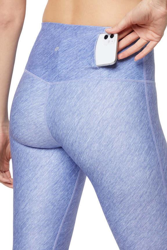 Fia Mid Calf Capri, side view showing pocket placement, showing visible design features and texture of the soft knit fabric.. 