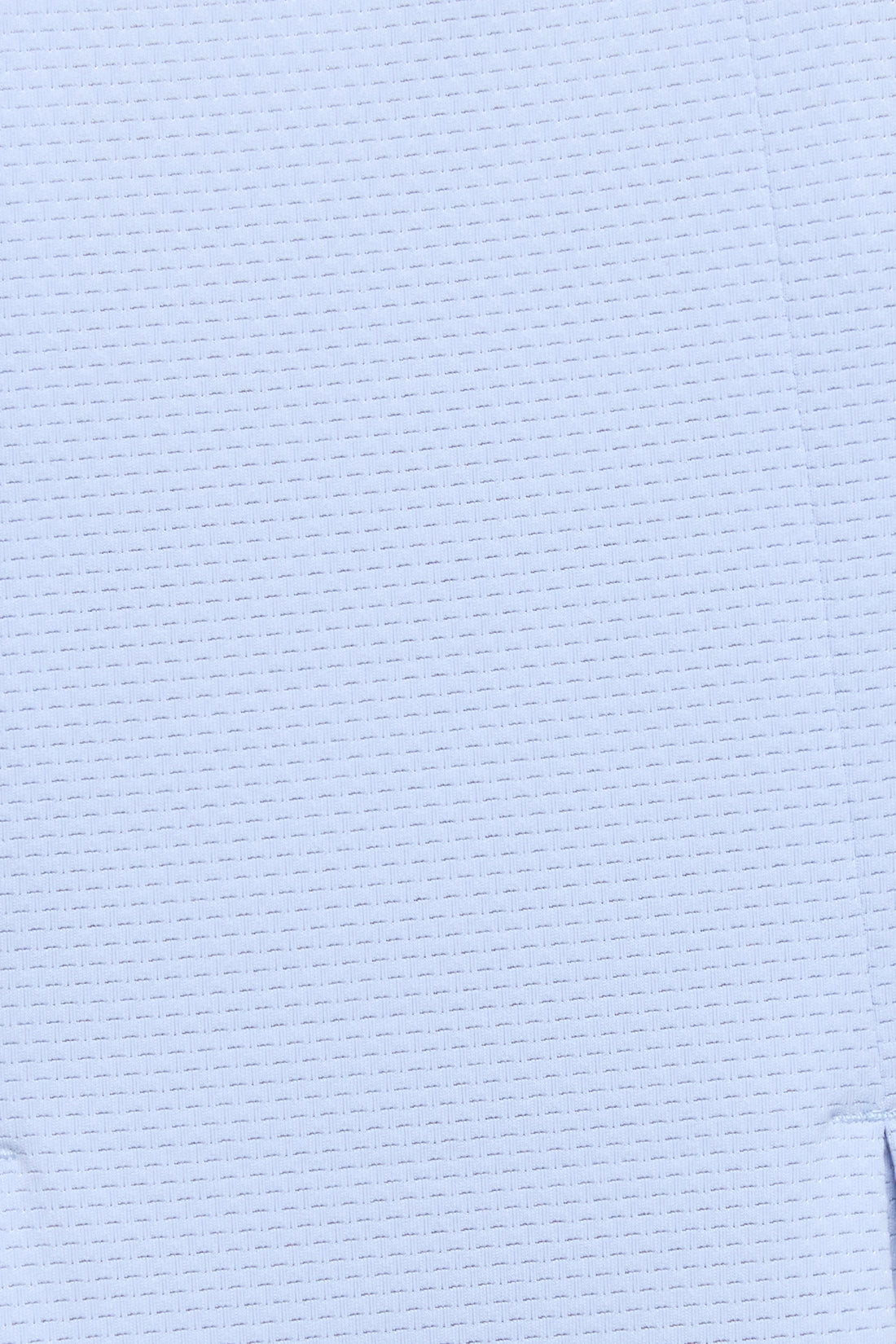 A close-up of a light blue textured fabric with a fine, woven grid-like pattern. 