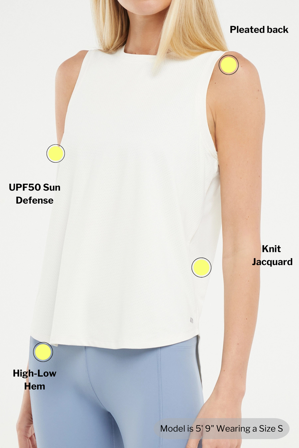 White sleeveless top with features labeled on a model wearing it. #color_sugar-swizzle