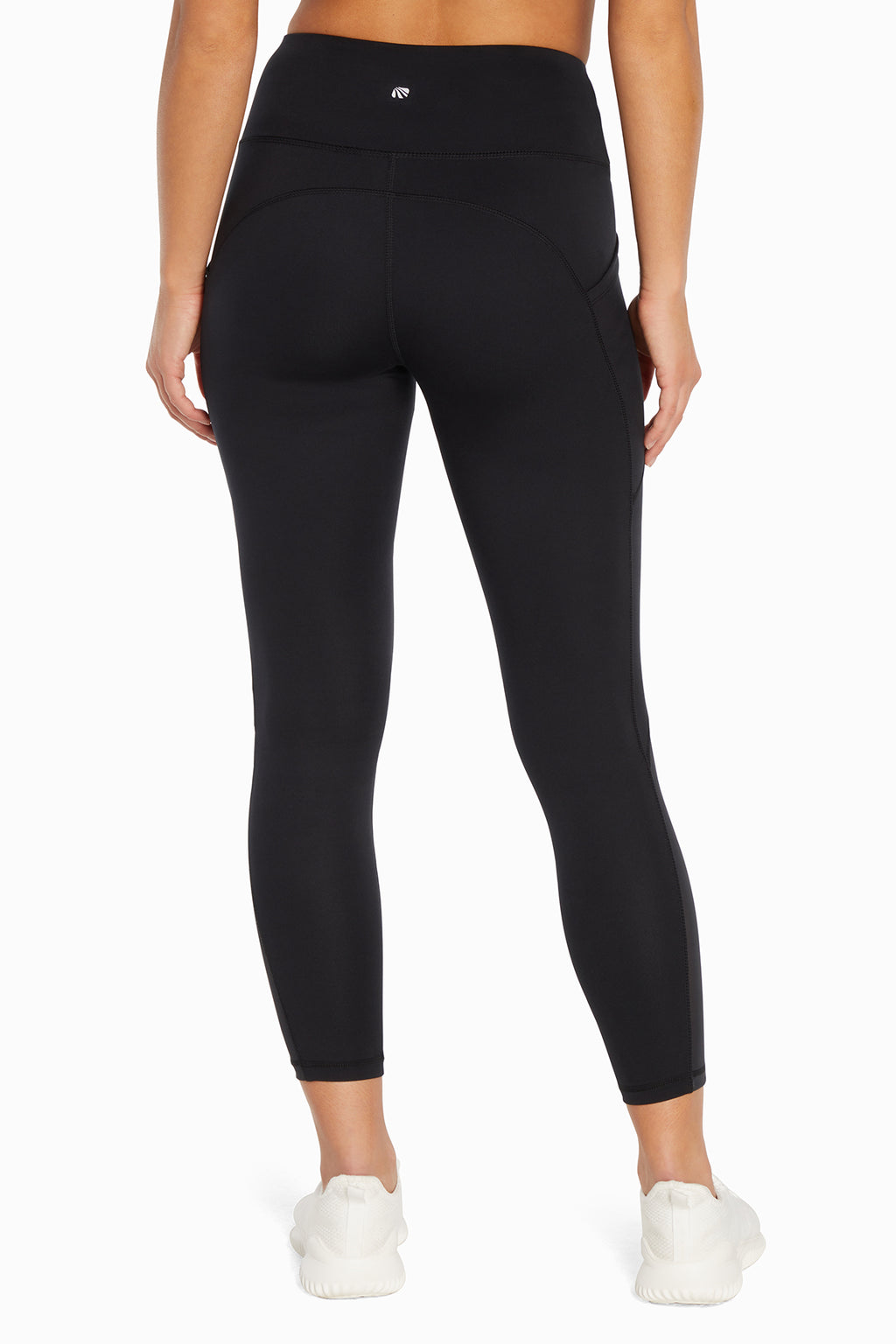 Kira Side Pocket Ankle Legging - Black, back view, showing visible design features and texture of the stretch knit fabric.. #color_black