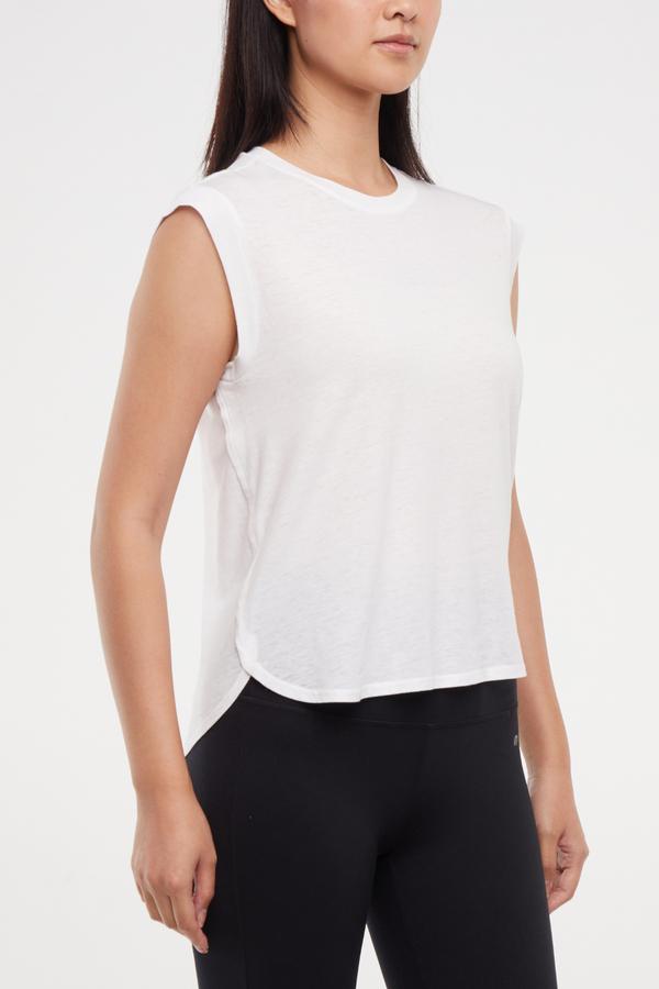 Leona Short Sleeve Top, close-up view of fabric and stitching, showing visible design features and texture of the soft knit fabric.. 