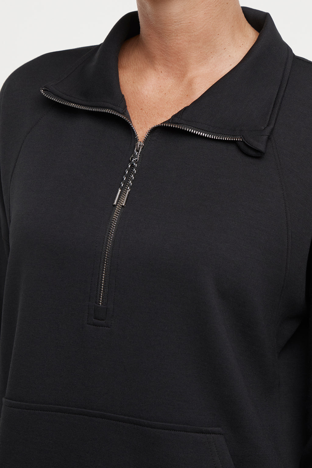 Sage 1/2 Zip, alternate angle view, showing visible design features and texture of the soft knit fabric.. #color_black