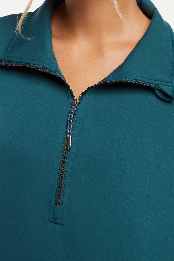 Sage 1/2 Zip, back view, showing visible design features and texture of the soft knit fabric.. #color_green-heron