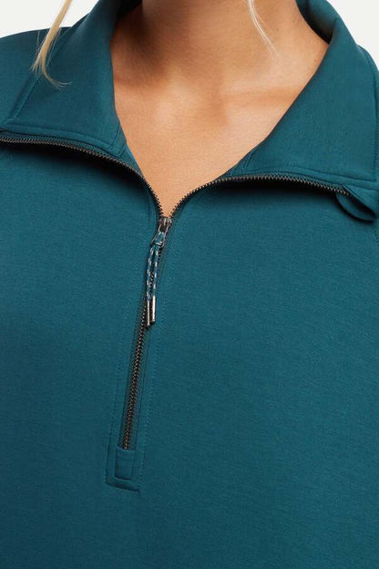 Sage 1/2 Zip, back view, showing visible design features and texture of the soft knit fabric.. 