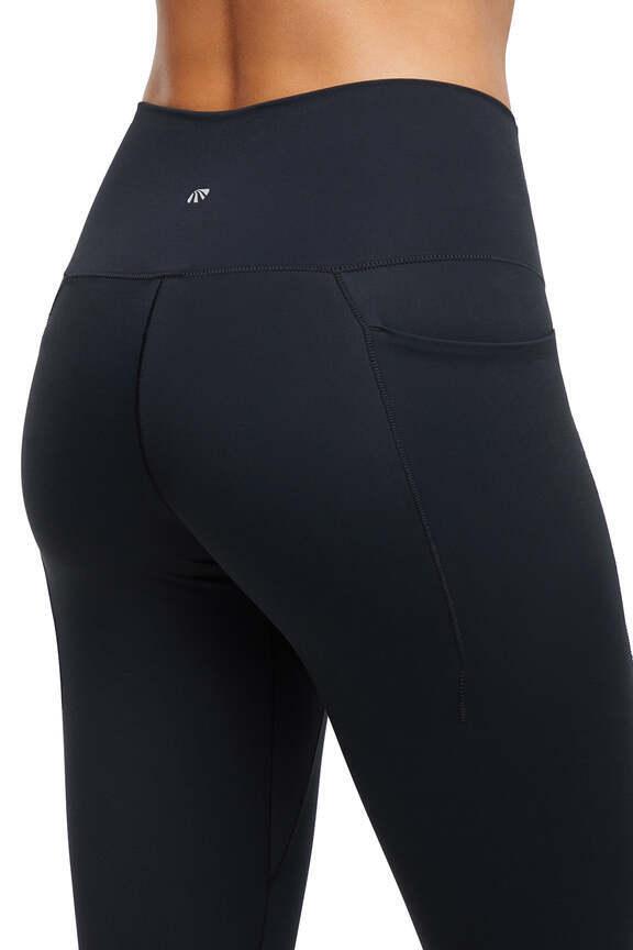 Kate Side Pocket Legging, alternate angle view, showing visible design features and texture of the stretch knit fabric.. #color_black