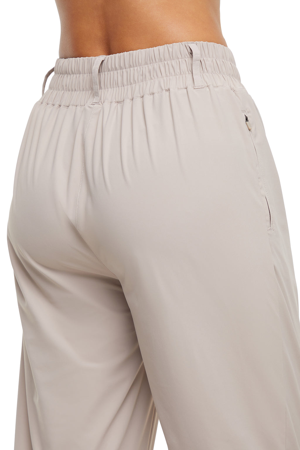 Nori Tapered Pant, alternate angle view, showing visible design features and texture of the durable stretch fabric.. #color_atmosphere
