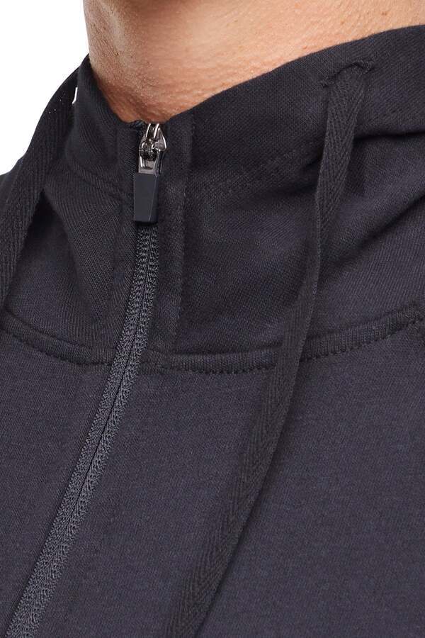 Lyla Jacket, alternate angle view, showing visible design features and texture of the smooth woven fabric.. 