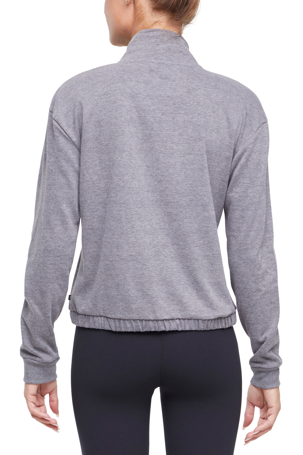 Lyla 1/2 Zip Pullover, side view showing pocket placement, showing visible design features and texture of the soft knit fabric.. #color_heather-charcoal