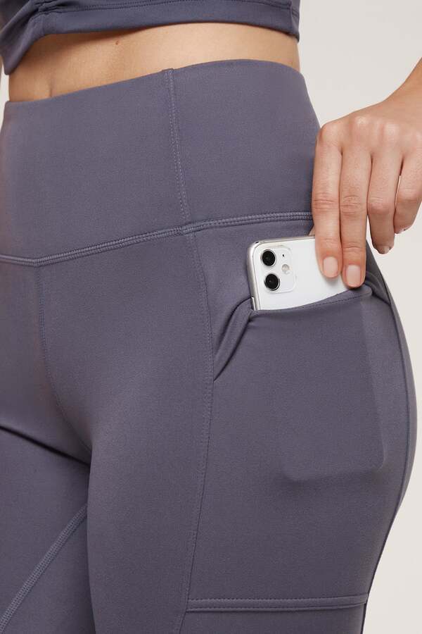 Faye Side Pocket Legging, alternate angle view, showing visible design features and texture of the stretch knit fabric.. #color_graystone
