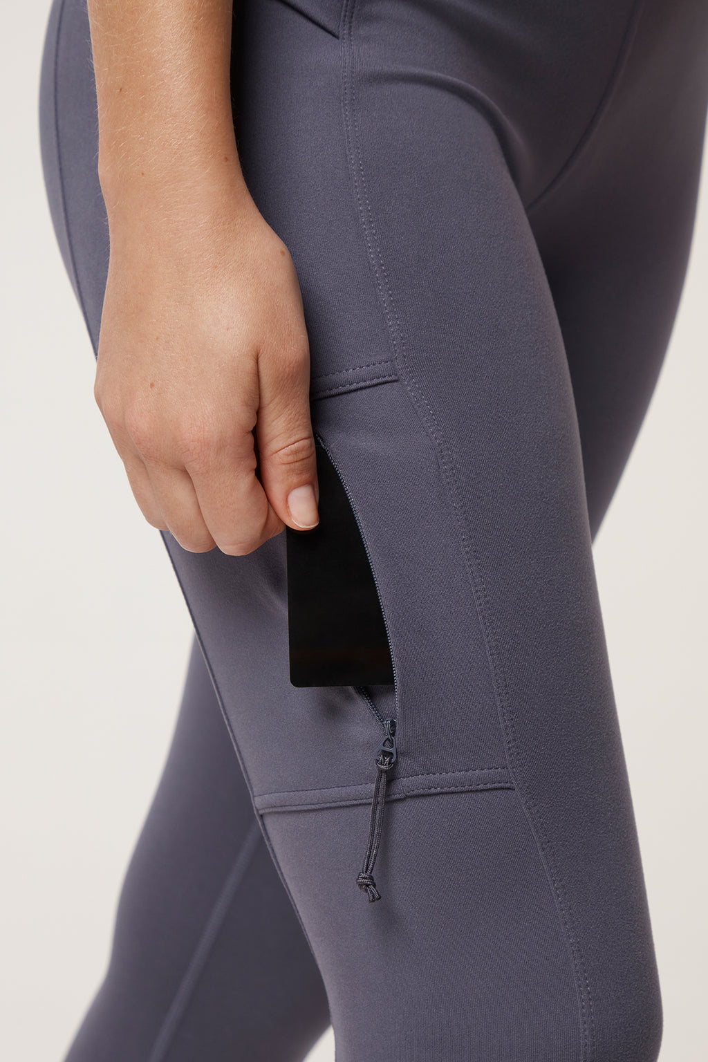 Faye Side Pocket Legging, back view, showing visible design features and texture of the stretch knit fabric.. #color_graystone
