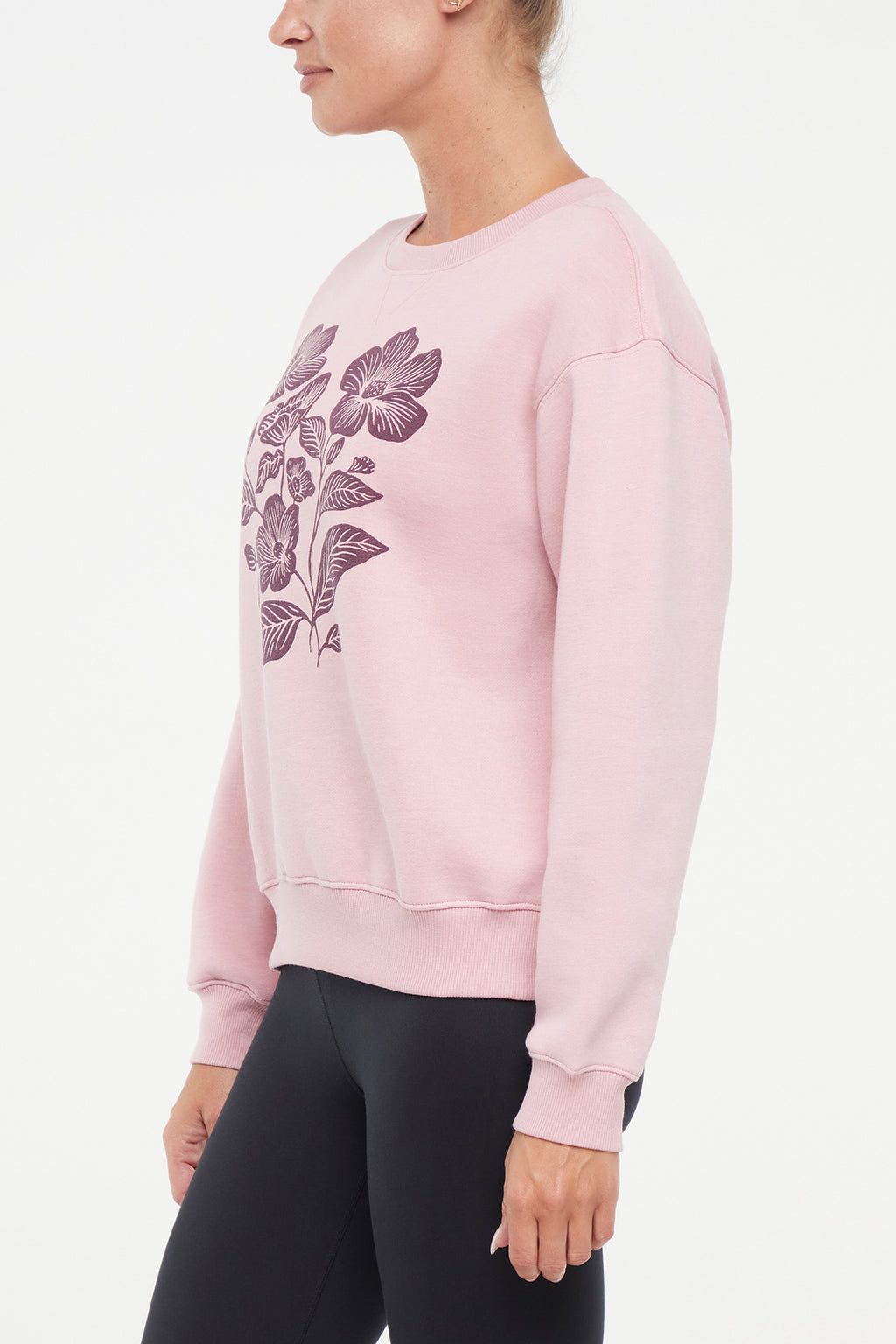 Meira Fleece Sweatshirt, close-up view of fabric and stitching, showing visible design features and texture of the soft knit fabric.. #color_heather-zephyr-floral-outlines