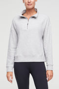 Freyi Pullover, alternate angle view, showing visible design features and texture of the soft knit fabric.. #color_heather-grey