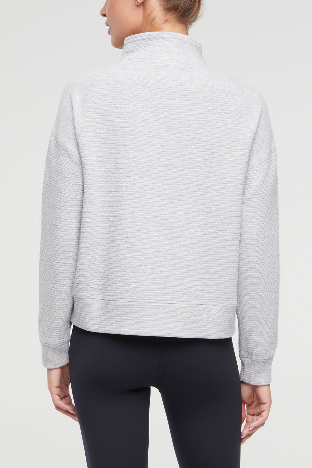 Freyi Pullover, alternate angle view, showing visible design features and texture of the soft knit fabric.. #color_heather-grey