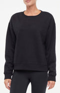 Camila Pullover, front view, showing visible design features and texture of the soft knit fabric.. #color_black