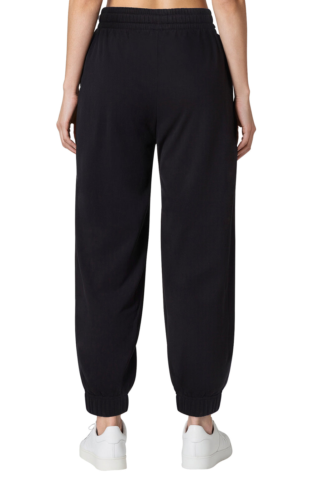 Camila Jogger, back view, showing visible design features and texture of the soft knit fabric.. #color_black