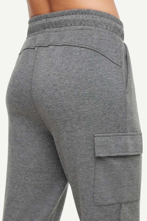 Journey Cargo Jogger, side view showing pocket placement, showing visible design features and texture of the soft knit fabric.. 