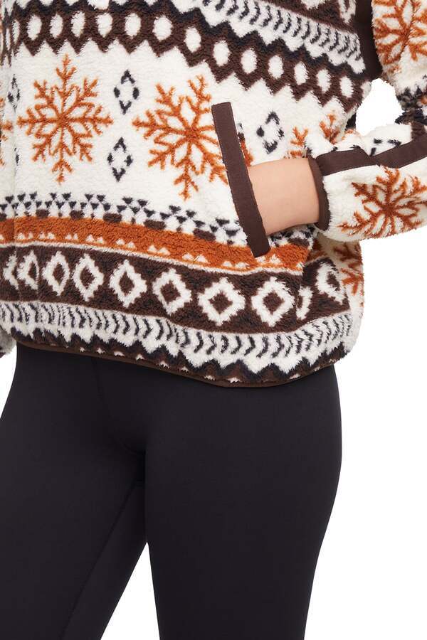 Caliste 1/4 Zip Sherpa Pullover, close-up view of fabric and stitching, showing visible design features and texture of the soft knit fabric.. 