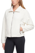 Blair Sherpa Jacket, alternate angle view, showing visible design features and texture of the smooth woven fabric.. #color_egret