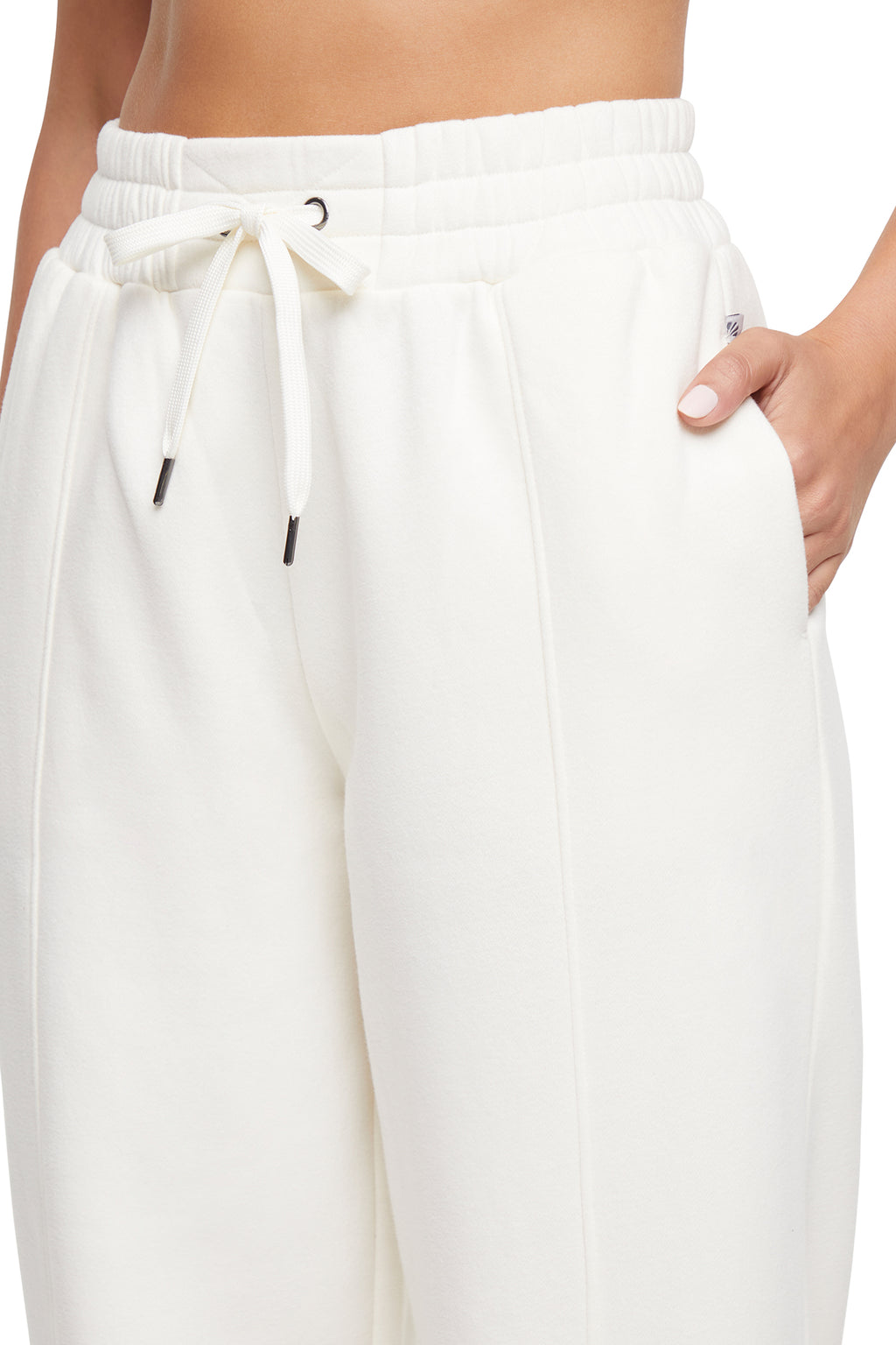 Calliope Jogger, back view, showing visible design features and texture of the soft knit fabric.. #color_egret