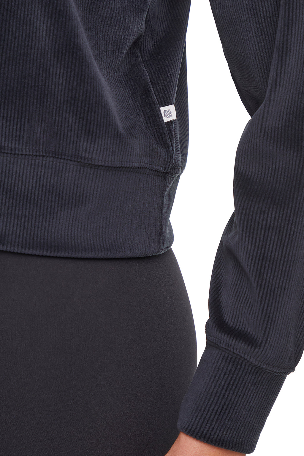 Stormi Sweatshirt, alternate angle view, showing visible design features and texture of the soft knit fabric. #color_black