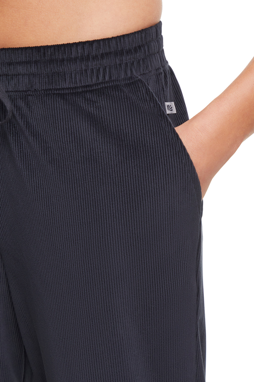 Stormi Pant, alternate angle view, showing visible design features and texture of the durable stretch fabric.. #color_black
