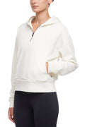 Calliope 1/4 Zip Hoodie, front view, showing visible design features and texture of the soft fleece fabric.. #color_egret