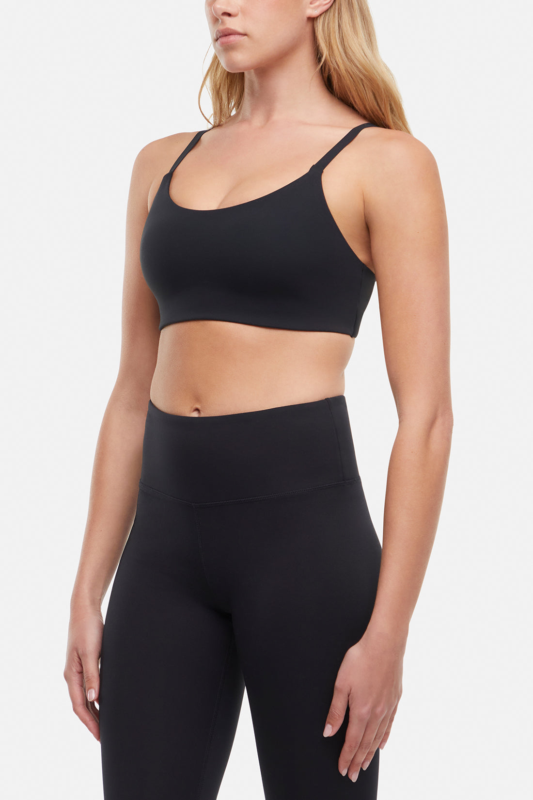 Alba Sports Bra, front view, showing visible design features and texture of the soft knit fabric.