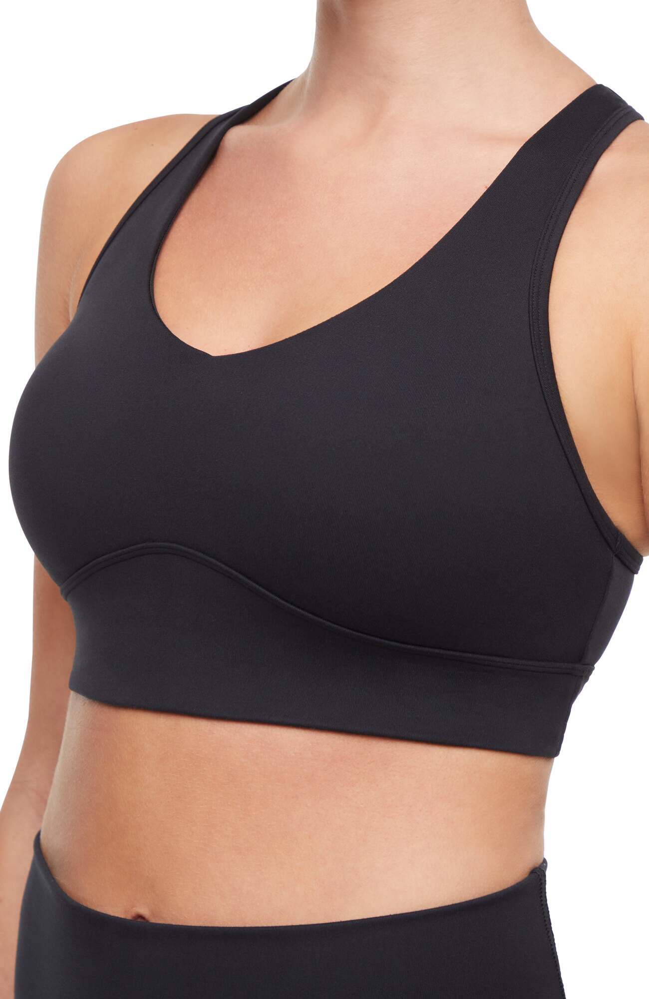 Rubina Sports Bra, alternate angle view, showing visible design features and texture of the soft knit fabric.. 