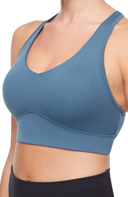 Rubina Sports Bra, back view, showing visible design features and texture of the soft knit fabric.. 