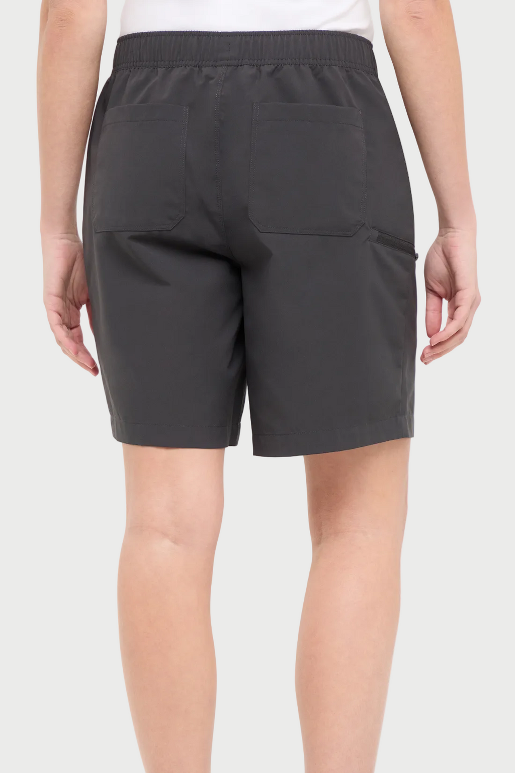 Back view of woman wearing dark gray shorts with a white drawstring, standing on a white background. #color_phantom