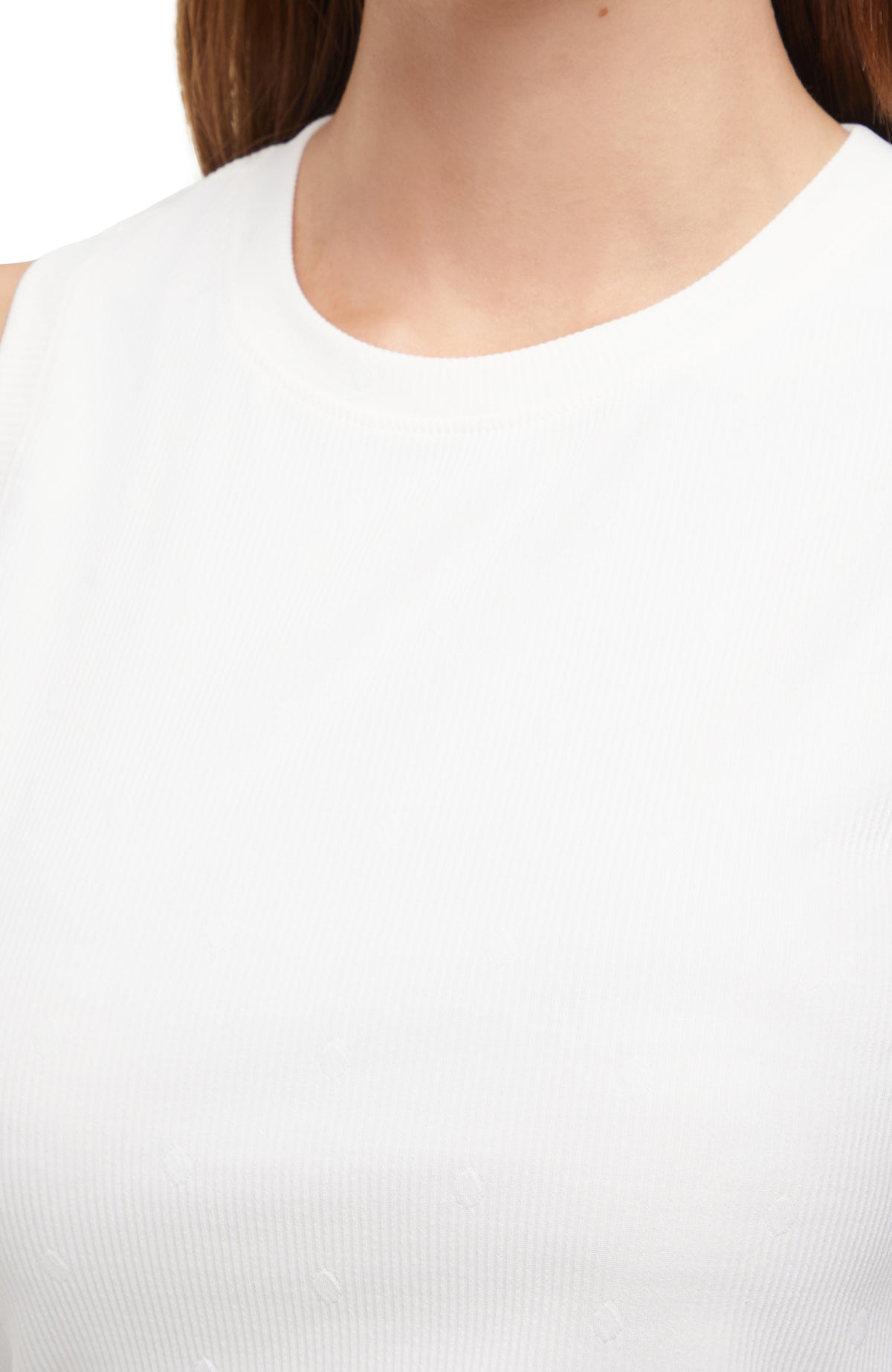Close up neckline view of woman wearing a white sleeveless top and skirt set on a white background. #color_sugar-swizzle