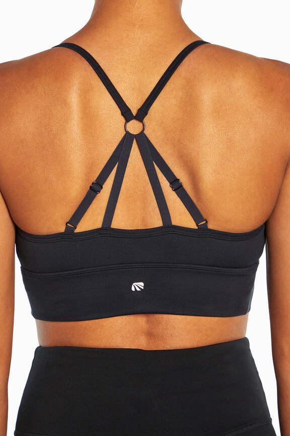 Alli Sports Bra, alternate angle view, showing visible design features and texture of the soft knit fabric.. 