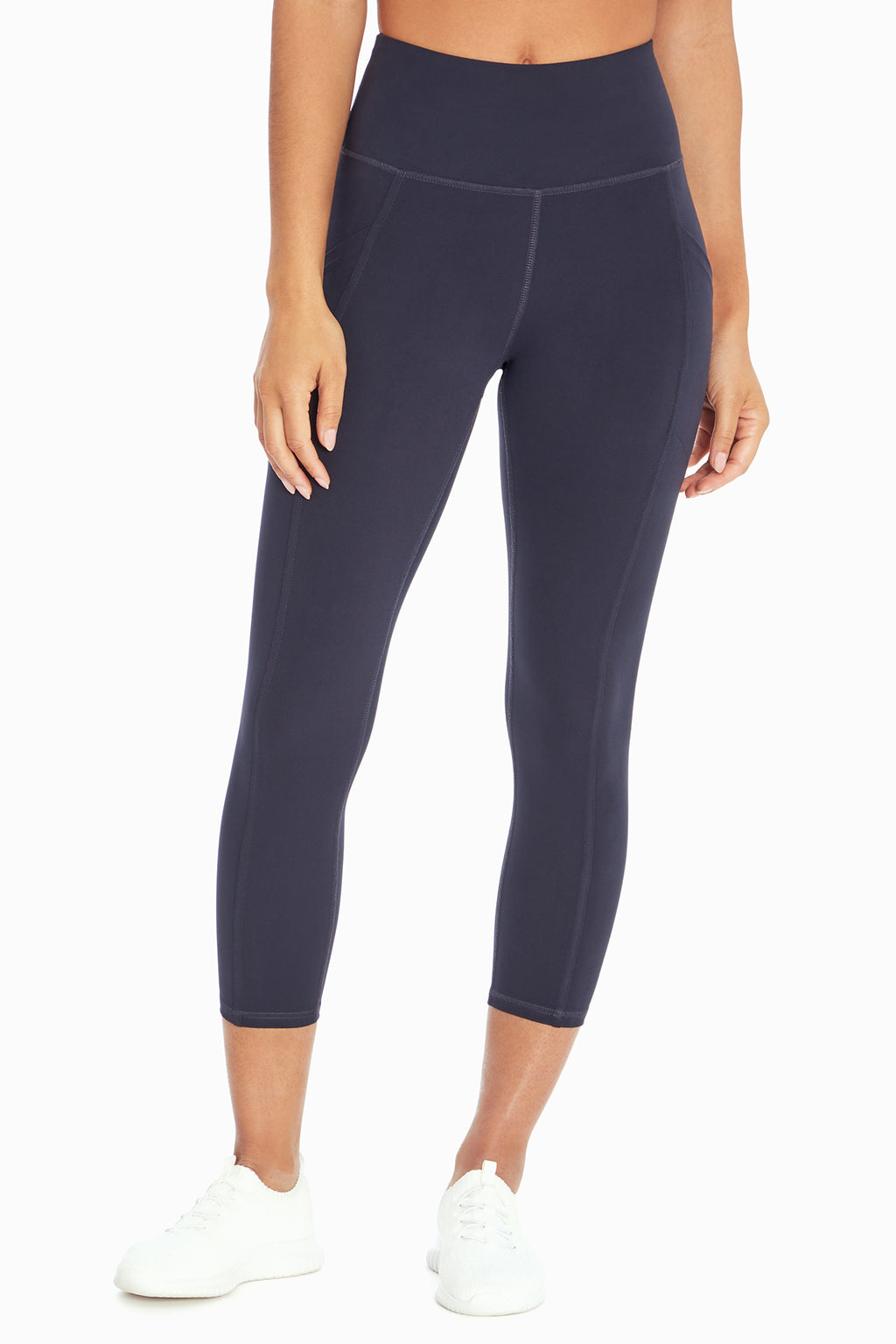 Drew Side Pocket Tummy Control Mid Calf Capri, alternate angle view, showing visible design features and texture of the soft knit fabric.. #color_midnight-blue