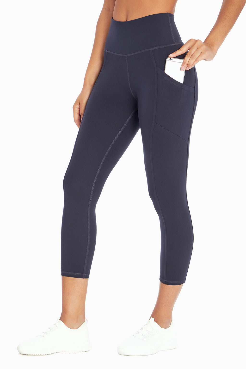 Drew Side Pocket Tummy Control Mid Calf Capri, alternate angle view, showing visible design features and texture of the soft knit fabric.. #color_midnight-blue