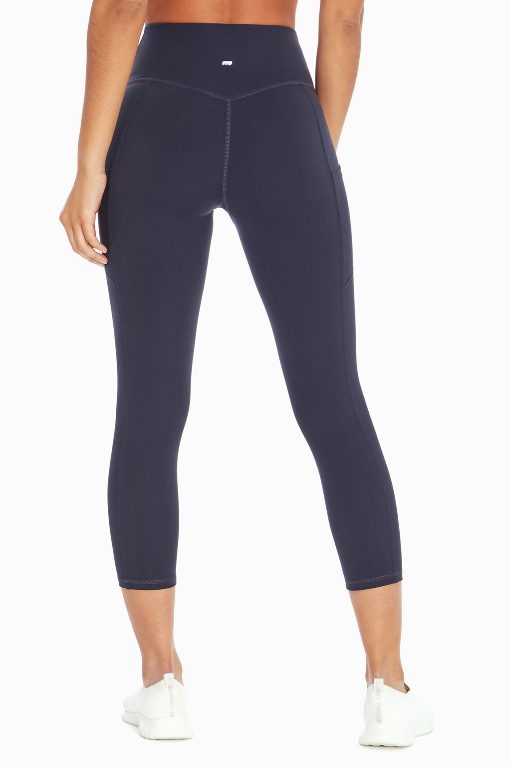 Drew Side Pocket Tummy Control Mid Calf Capri, alternate angle view, showing visible design features and texture of the soft knit fabric.. #color_midnight-blue