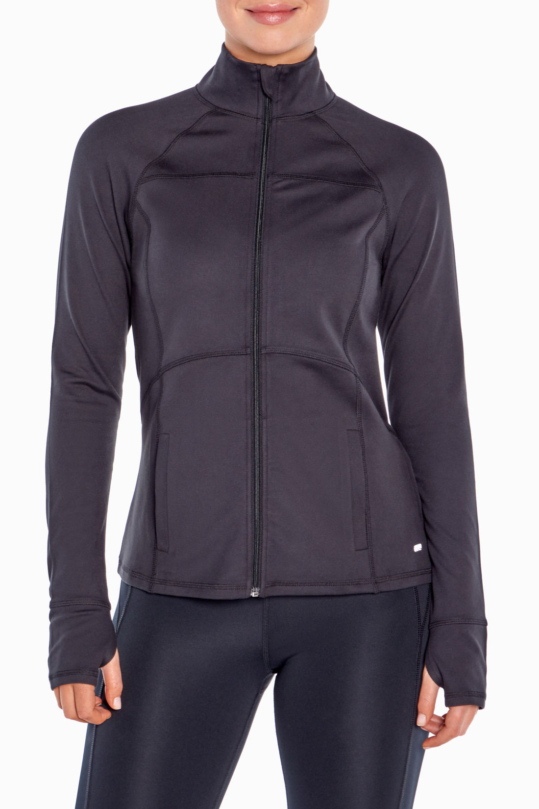 Revival Jacket, close-up view of fabric and stitching, showing visible design features and texture of the smooth woven fabric.. 