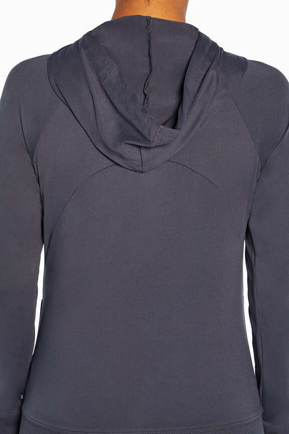 Mona Jacket, alternate angle view, showing visible design features and texture of the smooth woven fabric.. 